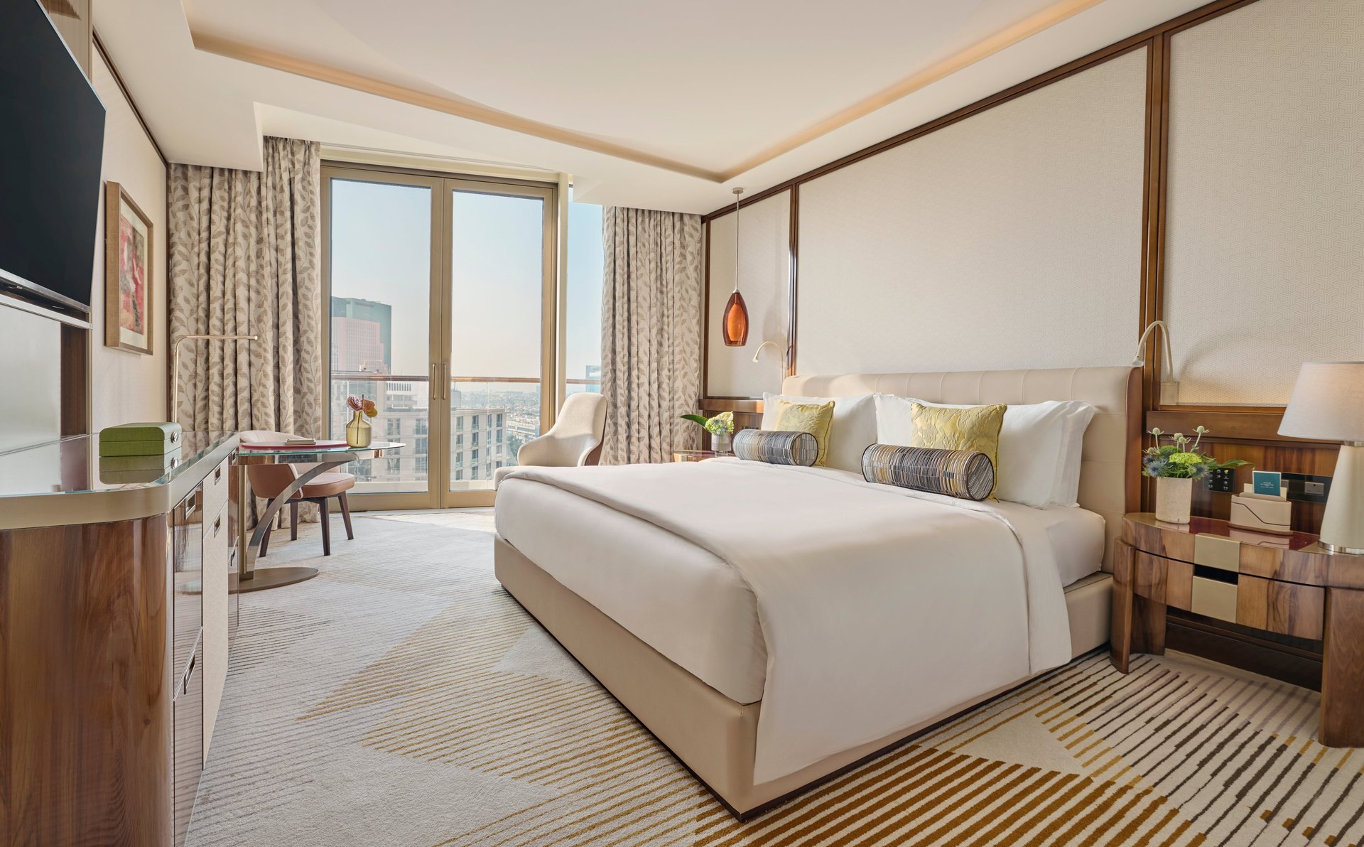 A Deluxe room at Mandarin Oriental Al Faisaliah, Riyadh, with a balcony over the city