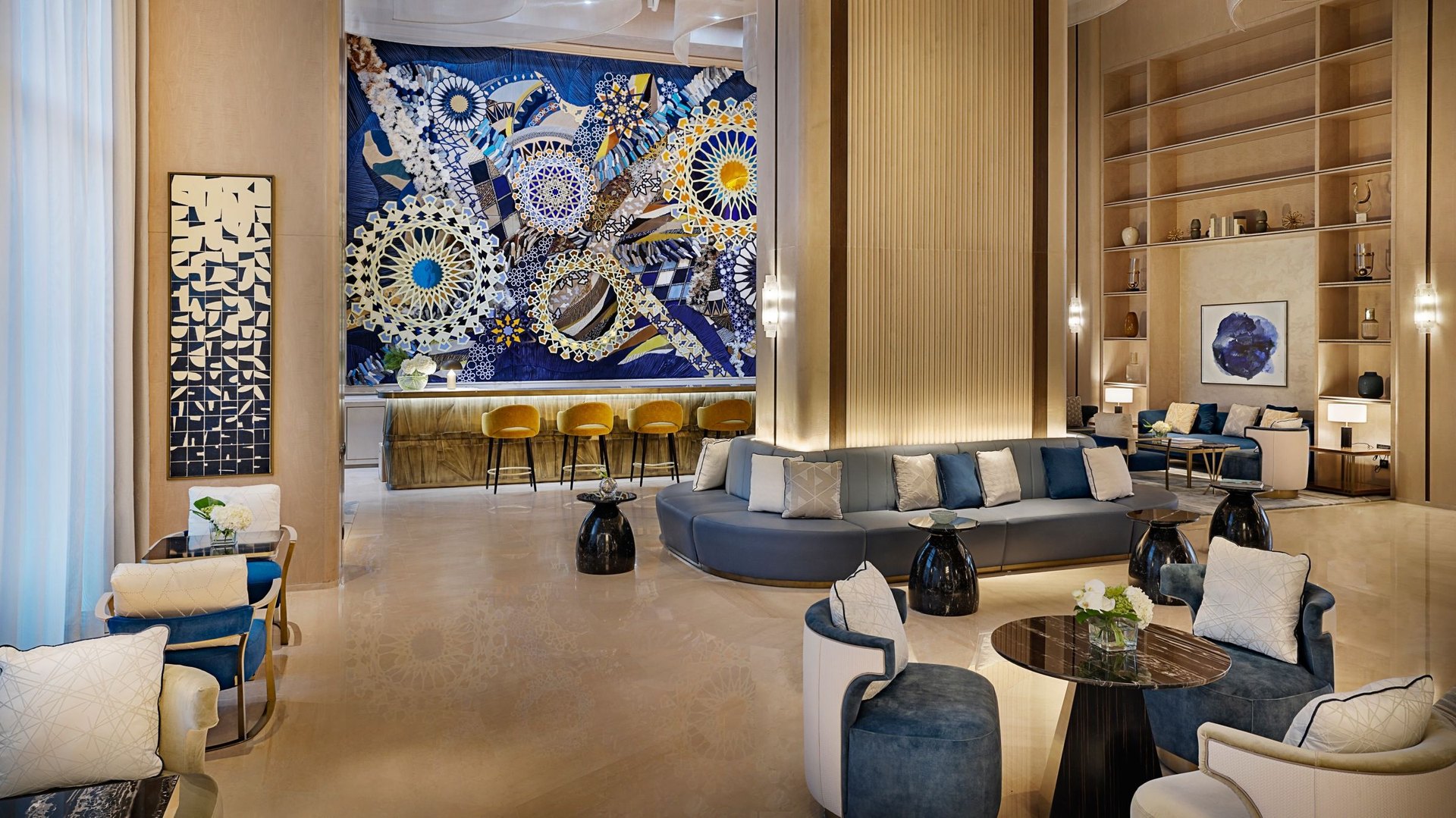 The St. Regis Bar in Riyadh, its blue-and-gold mural above the counter