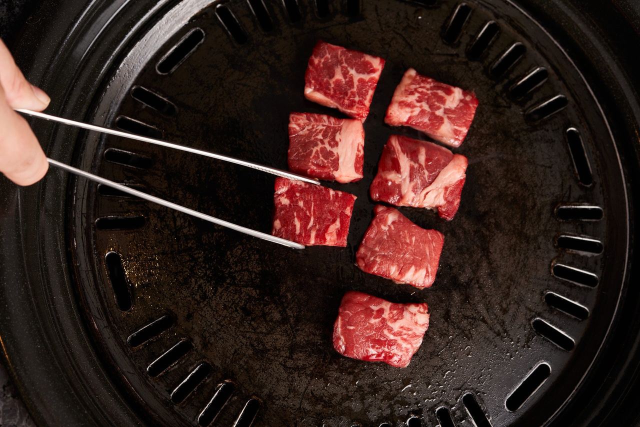 Marbled beef on the table grill at Namu, the Korean barbecue at The Esplanade
